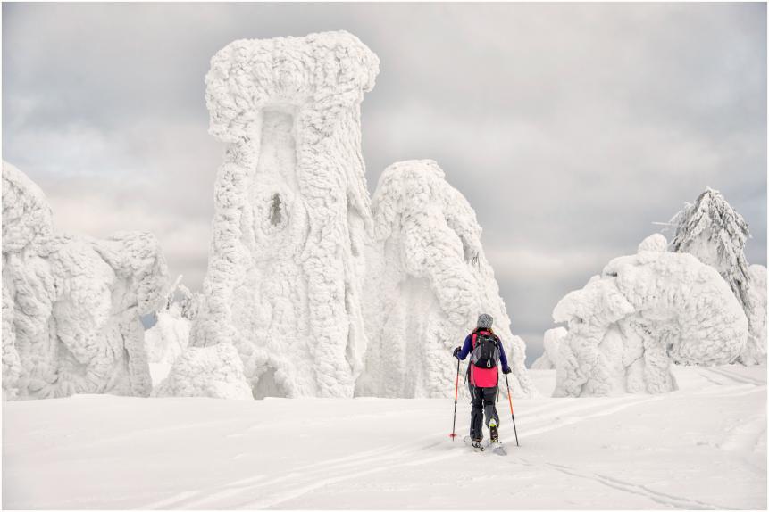 Ski touring is skiing in the backcountry on unmarked or unpatrolled areas