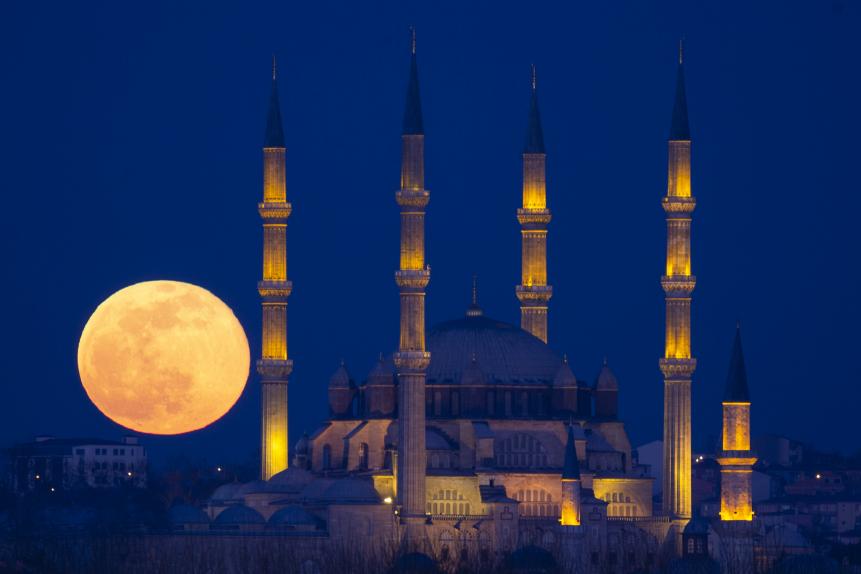 EDIRNE, TURKEY - FEBRUARY 09: Supermoon is seen with Selimiye Mosque in Edirne, Turkey on February 9, 2020. Supermoon is a full moon that almost coincides with the closest distance that the Moon reaches to Earth in its elliptic orbit, resulting in a larger-than-usual visible size of the lunar disk as seen from Earth. (Photo by Gokhan Balci/Anadolu Agency via Getty Images)