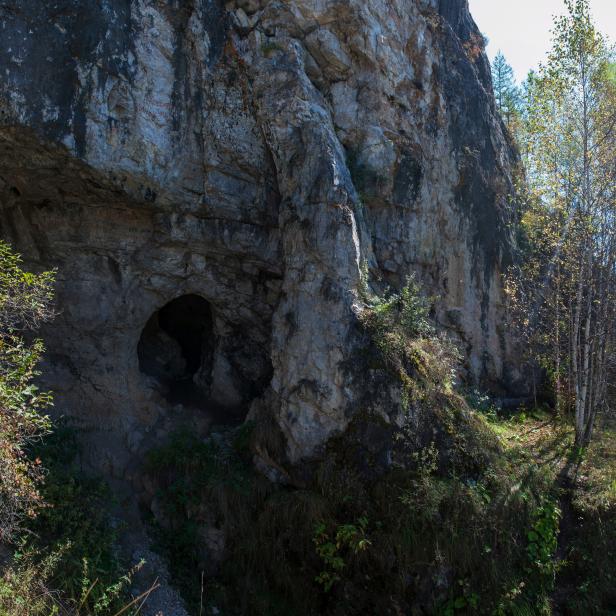 Denisova caves is a cave in the Altai mountains, Siberia, Russia. The cave is of great paleoarchaeological and paleontological interest.