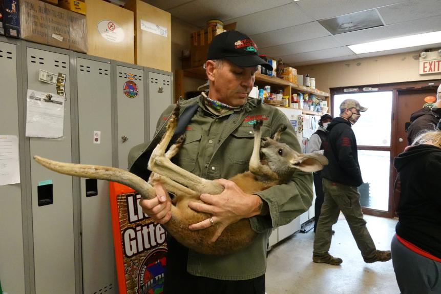 Best buds! Wildlife Command Center C.E.O Michael Beran holds an adopted kangaroo
