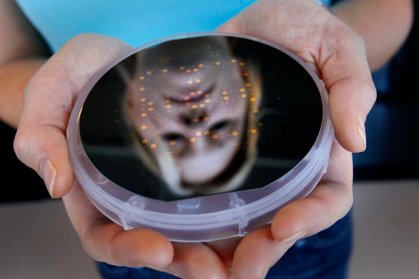 Jennifer Blundo with a Micro Electrode Array