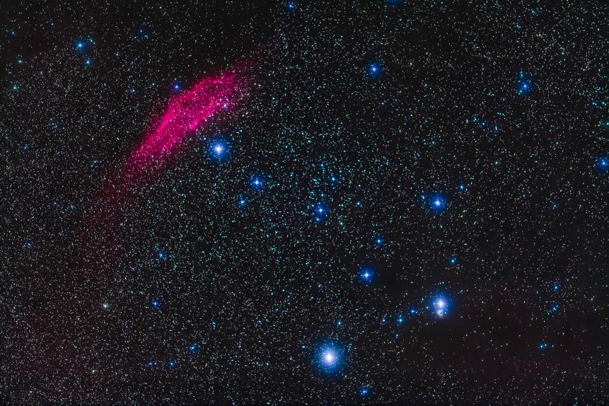 The California Nebula, NGC 1499, at top left, with the bright star Zeta Persei. at bottom A faint region of reflection nebulosity, IC 348, surrounds the star Atik, or Omicron Persei, at bottom right. The star just below NGC 1499 is Menkib, or Xi Persei. The field is similar to that of binoculars.   This is a stack of 5 x 3-minute exposures with the filter-modified Canon 5D MkII at ISO 800 and 200mm Canon L-Series lens at f/2.8. An additional exposure taken through the Kenko Softon A filter is layered in to add the star glows to bring out their colours. Taken with the Fornax Lightrack tracker as part of testing. Taken from home on a rare fine and mild winter night, January 4, 2019. (Photo by: Alan Dyer/VWPics/Universal Images Group via Getty Images)