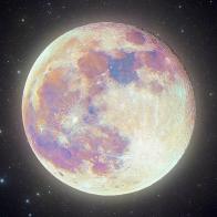 Highly detailed "Supermoon" Pink Moon image with a star field background