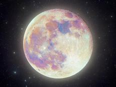 Highly detailed "Supermoon" Pink Moon image with a star field background