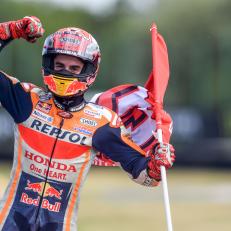 TOPSHOT - Winner Repsol Honda Team's Spanish rider Marc Marquez celebrates after the Moto GP Czech Grand Prix in Brno on August 4, 2019. (Photo by Michal CIZEK / AFP)        (Photo credit should read MICHAL CIZEK/AFP/Getty Images)