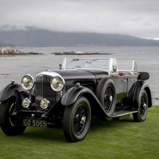 A 1931 Bentley 8 litre Gurney Nutting Sport Tourer, winner of the Best of Show award, owned by Billionaire Michael Kadoorie, chairman of Hong Kong And Shanghai Hotels Ltd., stands on the 18th fairway at the 2019 Pebble Beach Concours d'Elegance in Pebble Beach, California, U.S., on Sunday, Aug. 18, 2019. Roughly more the 20,000 attendees gather for the annual car event that spreads out over a weeks time. More than 20,000 car enthusiasts gathered for the Pebble Beach Concours D'Elegance, where total auction sales are expected to bring in $378 million this year. Photographer: David Paul Morris/Bloomberg via Getty Images