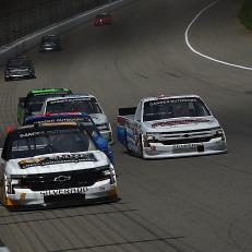 BROOKLYN, MICHIGAN - AUGUST 10: Sheldon Creed, driver of the #2 Chevrolet Accessories Chevrolet, leads a pack of trucks during the NASCAR Gander Outdoor Truck Series Corrigan Oil 200 at Michigan International Speedway on August 10, 2019 in Brooklyn, Michigan. (Photo by Stacy Revere/Getty Images)