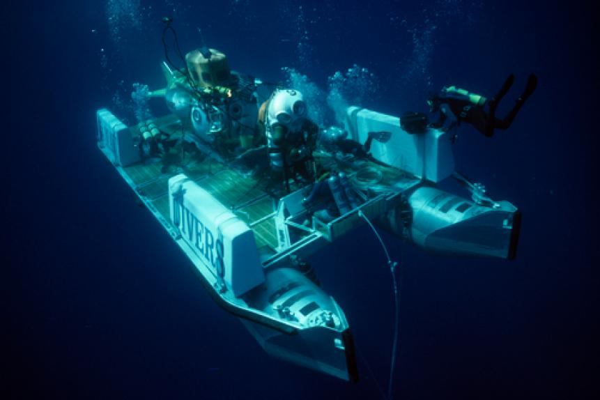 A transport launches Jim and Star II sixty feet below the surface.