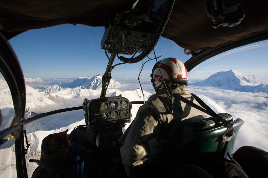 I was the first photojournalist to ever have the opportunity to document the important and incredible work of the National Park Service Search and Rescue team in Denali National Park, Alaska. This is an extremely rare view, and not one a mountain climber would ever want to see, as it's taken from the specialized high-altitude helicopter known as the Denali Lama. It's only used in rescue missions, and I was able to catch a ride down in it during one such rescue, giving me a unique view of the tops of the highest mountains on the continent.