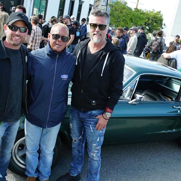 Jason, Richard and Chad McQueen pose for a photo.