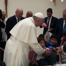 Pope Francis gets to know Syrian refugee children a little better.
