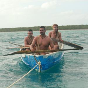 Matt, Amber, and Alex being pulled in boat.