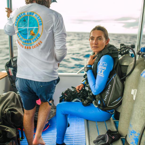 Kinga Philipps prepares to dive with sharks in Turks and Caicos.