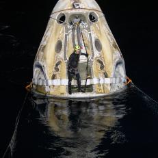 Support teams work around the SpaceX Crew Dragon Resilience spacecraft shortly after it landed with NASA astronauts Mike Hopkins, Shannon Walker, and Victor Glover, and Japan Aerospace Exploration Agency (JAXA) astronaut Soichi Noguchi aboard in the Gulf of Mexico off the coast of Panama City, Florida, Sunday, May 2, 2021.  NASA’s SpaceX Crew-1 mission was the first crew rotation flight of the SpaceX Crew Dragon spacecraft and Falcon 9 rocket with astronauts to the International Space Station as part of the agency’s Commercial Crew Program. Photo Credit: (NASA/Bill Ingalls)