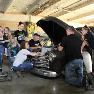 JJ and the MSO crew work on Ole Heavy in prep for the next race night.