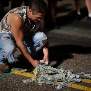 JJ gathers up the cash put for Street Wars.