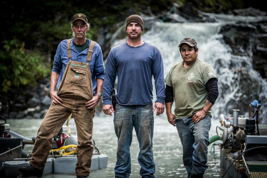 Wes Richardson, Dustin Hurt and Carlos Minor stood in the creek.