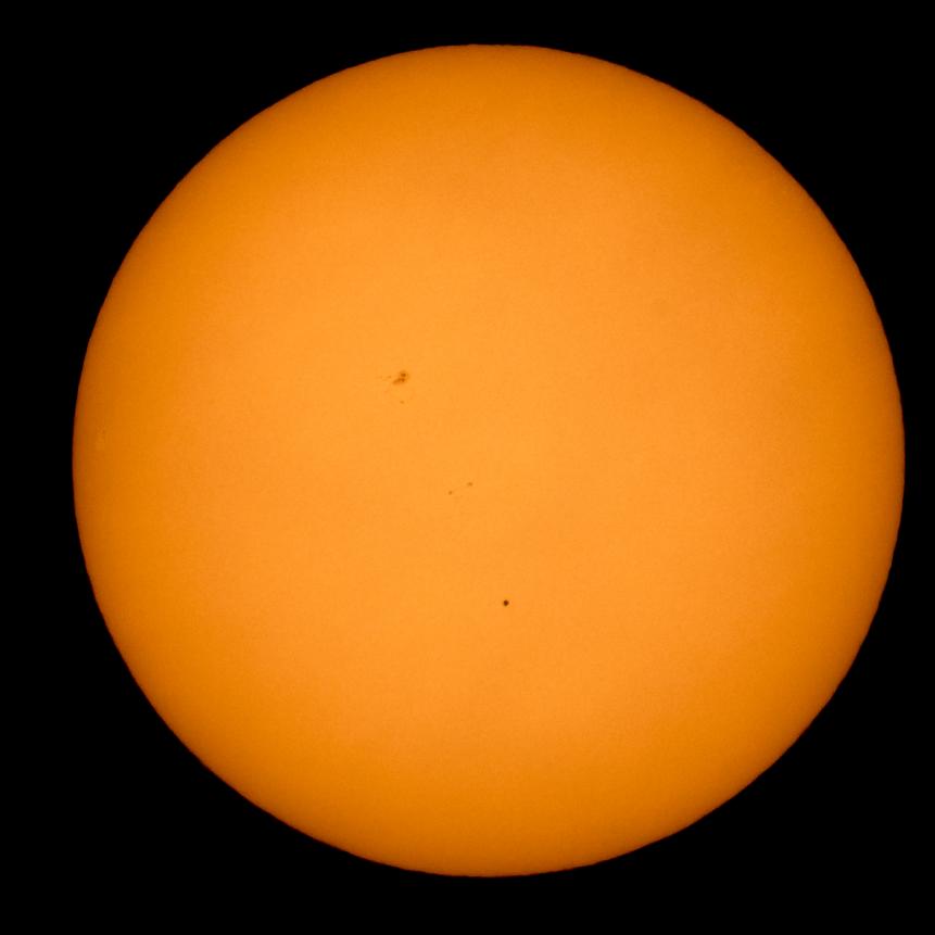 BOYERTOWN, PA - MAY 9: In this handout provided by NASA, the planet Mercury is seen in silhouette, lower center of image, as it transits across the face of the sun on May 9, 2016 as viewed from Boyertown, Pennsylvania.  Mercury passes between Earth and the sun only about 13 times a century, with the previous transit taking place in 2006.  (Photo by NASA/Bill Ingalls via Getty Images)