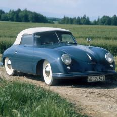 1951 Porsche 356. First launched in 1948, this Ferry Porsche designed car was a very compact sports car, produced in a number of body styles, with engine sizes ranging from 1100 to 1500cc. Production continued until 1955, by which time around 7600 had been built. (Photo by National Motor Museum/Heritage Images/Getty Images)