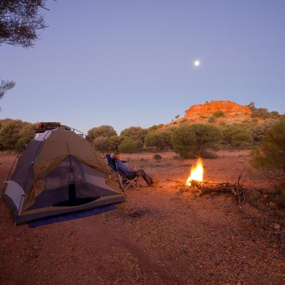 Camping by the Gun barrel Highway, with Mount Everard under a full moon. Gibson Desert near Warburton, Western Australia, Australia. (Photo by: Auscape/Universal Images Group via Getty Images)