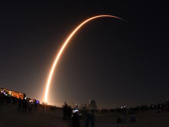 A SpaceX Falcon 9 rocket is seen in this time exposure from Cocoa Beach, Florida as it launches the company's third Starlink mission on January 6, 2020 from Cape Canaveral Air Force Station, in Cape Canaveral, Florida. The rocket is carrying 60 Starlink satellites as part of a planned constellation of thousands of satellites designed to provide internet services around the world. (Photo by Paul Hennessy/NurPhoto via Getty Images)