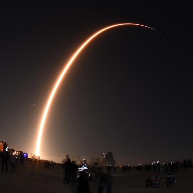 A SpaceX Falcon 9 rocket is seen in this time exposure from Cocoa Beach, Florida as it launches the company's third Starlink mission on January 6, 2020 from Cape Canaveral Air Force Station, in Cape Canaveral, Florida. The rocket is carrying 60 Starlink satellites as part of a planned constellation of thousands of satellites designed to provide internet services around the world. (Photo by Paul Hennessy/NurPhoto via Getty Images)