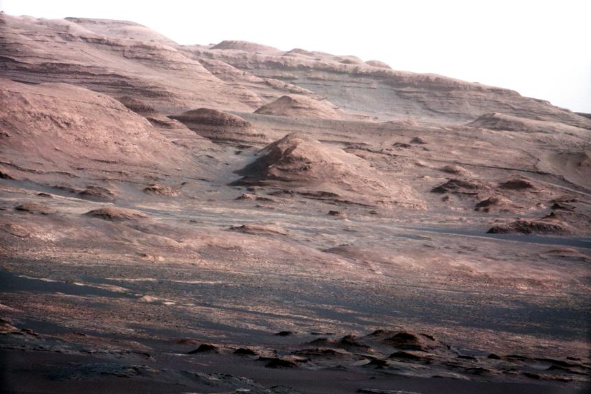 A chapter of the layered geological history of Mars is laid bare in this postcard from NASA's Curiosity rover. The image shows the base of Mount Sharp, the rover's eventual science destination. (Photo by: Universal History Archive/Universal Images Group via Getty Images)