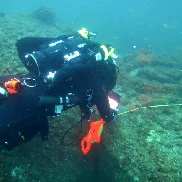 Michael C Barnette measuring the wreck of the SS Cotopaxi
