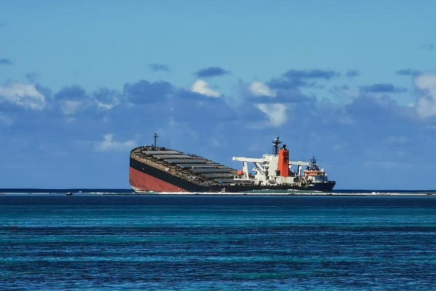 (EDITORS NOTE: Best quality available.) The MV Wakashio bulk carrier vessel, operated by Mitsui OSK Lines Ltd., sits partially submerged in the ocean after running aground close to Pointe d'Esny, Mauritius, on Friday, Aug. 14, 2020. The MV Wakashio leaked at least 1,000 tons of black sludge into the turquoise waters off the Indian Ocean islands southeastern coast after it ran aground on July 25. Photographer: Kamlesh Bhuckory/Bloomberg via Getty Images