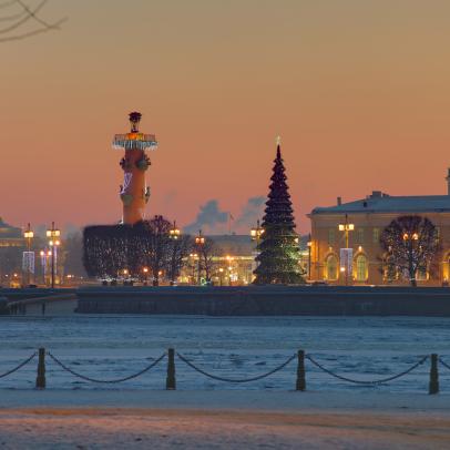 Spit of Vasilyevsky Island in St. Petersburg, Russia winter evening in Christmas decorations.