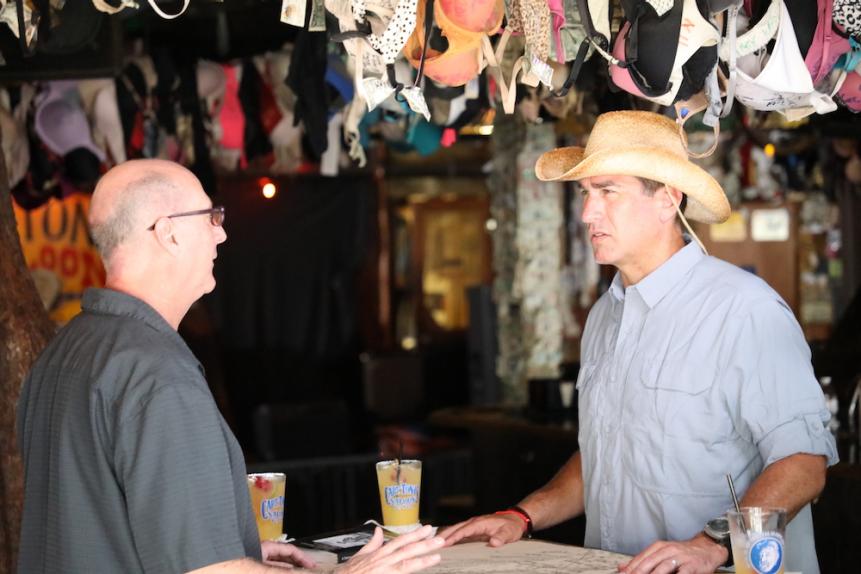 Rob Riggle meets with historian Brad Bertelli to learn the legend of pirate, Black Caesar, as seen on Discovery’s Rob Riggle: Global Investigator.