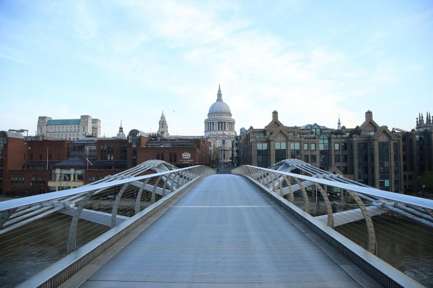 LONDON, ENGLAND - APRIL 12: A general view of the closed St Paul's Cathedral and Millennium Bridge on April 12, 2020 in London, England. Public Easter events have been cancelled across the country, with the government urging the public to respect lockdown measures by celebrating the holiday in their homes. Over 1.5 million people across the world have been infected with the COVID-19 coronavirus, with over 7,000 fatalities recorded in the United Kingdom. (Photo by Andrew Redington/Getty Images)