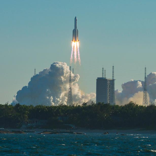 WENCHANG, CHINA - MAY 05: China's new large carrier rocket Long March-5B carrying the trial version of China's new-generation manned spaceship and a cargo return capsule blasts off from the Wenchang Space Launch Center on May 5, 2020 in Wenchang, Hainan Province of China. (Photo by Luo Yunfei/China News Service via Getty Images)