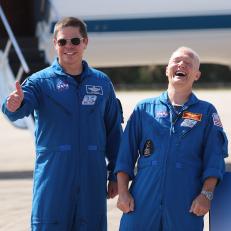 CAPE CANAVERAL, FLORIDA - MAY 20: NASA astronauts Bob Behnken (left) and Doug Hurley (right) enjoy a light moment together as they pose for the media after arriving at the Kennedy Space Center on May 20, 2020 in Cape Canaveral, Florida.  The astronauts arrived for the May 27th scheduled inaugural flight of SpaceXâ  s Crew Dragon spacecraft. They will be the first people since the end of the Space Shuttle program in 2011 to be launched into space from the United States. (Photo by Joe Raedle/Getty Images)