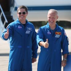 CAPE CANAVERAL, FLORIDA - MAY 20: NASA astronauts Bob Behnken (left) and Doug Hurley (right) pose for the media after arriving at the Kennedy Space Center on May 20, 2020 in Cape Canaveral, Florida.  The astronauts arrived for the May 27th scheduled inaugural flight of SpaceXâ  s Crew Dragon spacecraft. They will be the first people since the end of the Space Shuttle program in 2011 to be launched into space from the United States. (Photo by Joe Raedle/Getty Images)