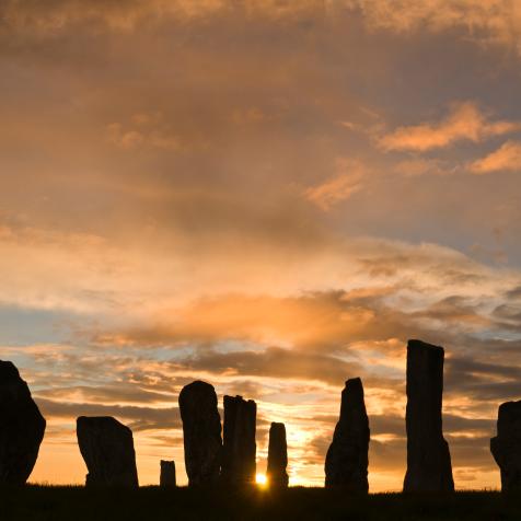 Sunrse through the ancient standing stones of Callanish 1