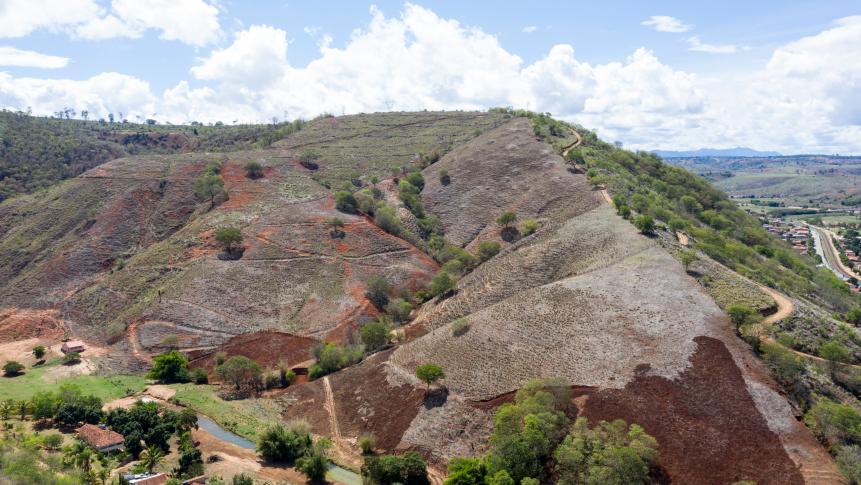 AIMORES, BRAZIL - NOVEMBER 22: Aerial view of  a former well-preserved hill, now deforested by deforestation in the village AimorÃ©s, near the Instituto Terra (about 500 meters away) on November 22, 2019 in AimorÃ©s, Brazil. Instituto Terra, founded in 1998 by the photographer Sebastiao Salgado and his wife, Lelia Deluiz Wanick Salgado, is an environmental NGO, located at Aimores, in the state of Minas Gerais, Brazil. The old Salgado's family cattle ranch was acquired by the couple and, in the last 20 years, over 2.5 million native Atlantic seedlings have been planted. The institute has defined its objectives as restoration of the ecosystem, production of Atlantic seedlings, environmental outreach programs, environmental education and applied scientific research. (Photo by Christian Ender/Getty Images)