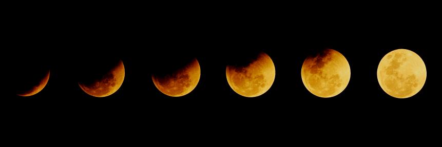 The moon after total eclipse ends in the different time on the dark night background in Chonburi, Thailand on January 31, 2018