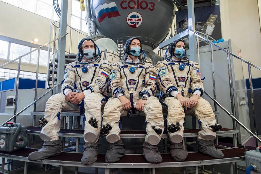 Expedition 64 crew members Russian cosmonaut Sergey Kud-Sverchkov of Roscosmos, left, Russian cosmonaut Sergey Ryzhikov of Roscosmos, center, and NASA astronaut Kate Rubins, pose for a photo during Soyuz qualification exams, Wednesday, Sept. 23, 2020 at the Gagarin Cosmonaut Training Center (GCTC) in Star City, Russia, in advance of their scheduled launch October 14 from Baikonur Cosmodrome in Kazakhstan to the International Space Station. Photo Credit: (NASA/GCTC/Andrey Shelepin)