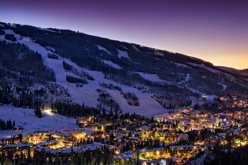 Dusk in Vail Colorado - View of ski slopes and Vail Village in Vail, Colorado.  Winter landscape with scenic view.