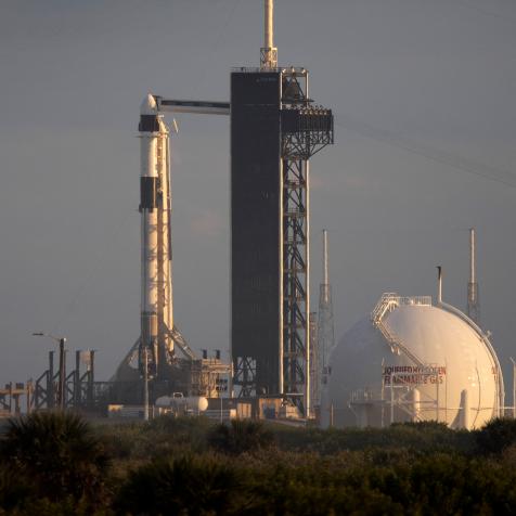 CAPE CANAVERAL, FLORIDA - NOVEMBER 01: The SpaceX Falcon 9 rocket and Crew Dragon capsule on launch Pad 39A at NASA's Kennedy Space Center after its scheduled launch was delayed on November 01, 2021 in Cape Canaveral, Florida. The rocket's launch has been postponed to at least Saturday because of what reportedly is a minor medical issue with a crew member. (Photo by Joe Raedle/Getty Images)