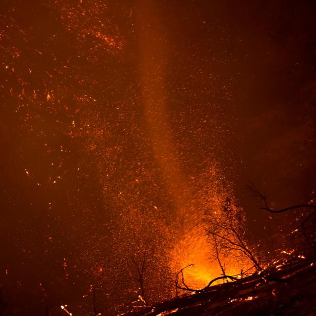 A fire whirl, or fire tornado, rises from a burning canyon, June 17, 2016 at the Sherpa Fire near Santa Barbara,California. - A fire in the Los Padres National Forest had expanded to two square miles (five square kilometers) by Thursday, making it the "largest since 2009" in the area, a spokesman for the Santa Barbara County Information Center told AFP. (Photo by DAVID MCNEW / AFP) (Photo by DAVID MCNEW/AFP via Getty Images)