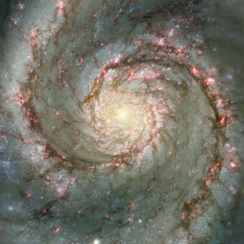 The Whirlpool Galaxy is a classic spiral galaxy. At only 30 million light years distant and fully 60 thousand light years across, M51, also known as NGC 5194, is one of the brightest and most picturesque galaxies on the sky. This image is a digital combination of a ground-based image from the 0.9-meter telescope at Kitt Peak National Observatory and a space-based image from the Hubble Space Telescope highlighting sharp features normally too red to be seen.