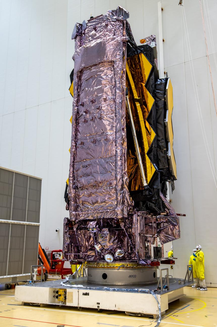 On Saturday, Dec. 11, NASA’s James Webb Space Telescope was secured on top of the Ariane 5 rocket that will launch it to space from Europe’s Spaceport in French Guiana.     After its arrival in the final assembly building, Webb was slowly hoisted nearly 130 feet and then perfectly aligned on top of the Ariane 5, after which technicians bolted Webb’s launch vehicle adapter down to the rocket.