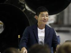 Yusaku Maezawa, founder and president of Start Today Co., speaks during an event at the SpaceX headquarters in Hawthorne, California, U.S., on Monday, Sept. 17, 2018. Elon Musk just revealed the identity of the precious cargo hitching a ride around the moon with his rocket company: Japanese billionaire Maezawa. Photographer: Patrick T. Fallon/Bloomberg via Getty Images