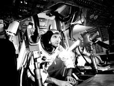 Photograph of the pilot Michael Collins at Apollo 11 Command Module, practicing docking hatch removal from CM simulator at NASA Johnson Space Center, Houston, Texas, June 28, 1969. Image courtesy National Aeronautics and Space Administration (NASA). (Photo by Smith Collection/Gado/Getty Images)