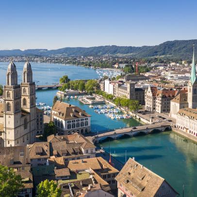 Zurich old town by the Limmat river on a sunny summer day in Switzerland largest city