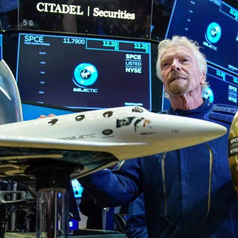 NEW YORK, NY - OCTOBER 28: Â Sir Richard Branson, Founder of Virgin Galactic, poses for photographs  before ringing a ceremonial bell on the floor of the New York Stock Exchange (NYSE) to promote the first day of trading of Virgin Galactic Holdings shares on October 28, 2019 in New York City. Virgin Galactic Holdings became the first space-tourism company to go public as it began trading on Monday with a market value of about $1 billion. (Photo by Drew Angerer/Getty Images)