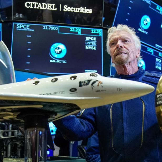 NEW YORK, NY - OCTOBER 28: Â Sir Richard Branson, Founder of Virgin Galactic, poses for photographs  before ringing a ceremonial bell on the floor of the New York Stock Exchange (NYSE) to promote the first day of trading of Virgin Galactic Holdings shares on October 28, 2019 in New York City. Virgin Galactic Holdings became the first space-tourism company to go public as it began trading on Monday with a market value of about $1 billion. (Photo by Drew Angerer/Getty Images)