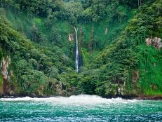 Waterfall nestled in the beautiful scenery of Cocos Island National Park.